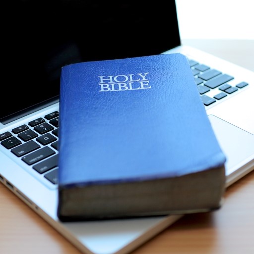 holy-bible-on-laptop-computer